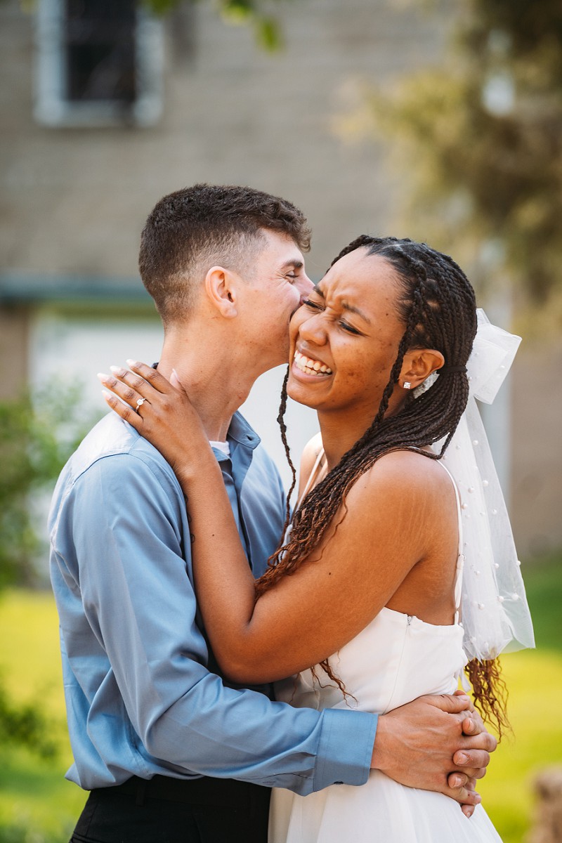 bride laughing with groom